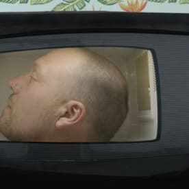 Darrin Bradbury Sticks His Head In A Microwave In New Video For Album Title Track "Artvertisement", Listen + Watch Now